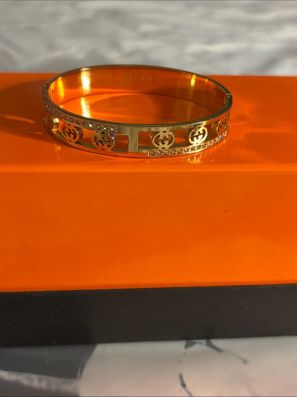 Brand New Gold Logo Cutout Bangle with Crystal Accents 👇